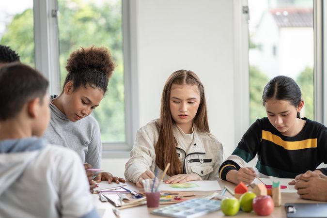 Young teens in painting class