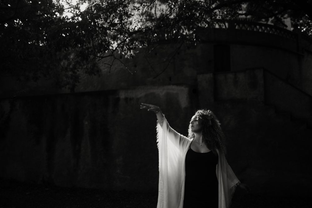 ethereal woman dancing in nature
