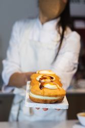 Crop cook with appetizing Berliners on board