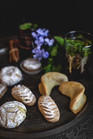Traditional tea with mint and assorted Arab sweets