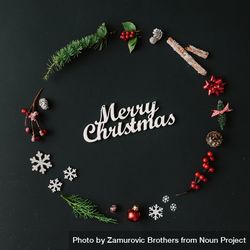 Christmas wreath made of winter items on dark background bxwdd4