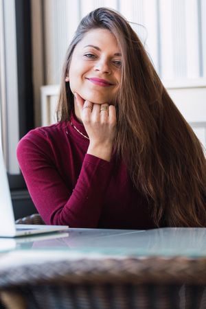 Portrait of smiling woman looking at camera