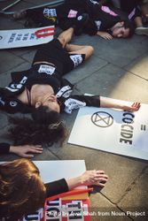 London, England, United Kingdom - September 15th,2019: Woman and man lying protesting on street 4AzXzb