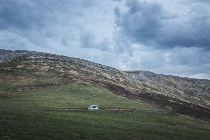 Caravan riding through hills