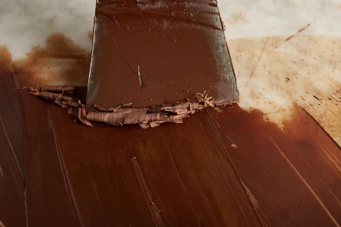 Close up of scraper and chocolate