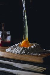 Preparation of dough and broken eggs