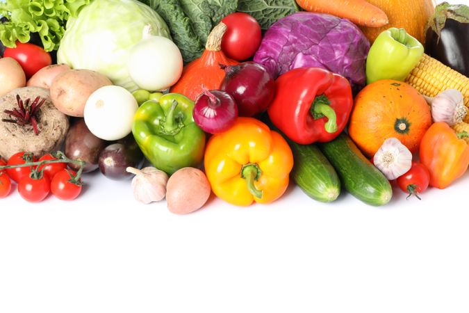 Composition with fresh vegetables isolated on plain background