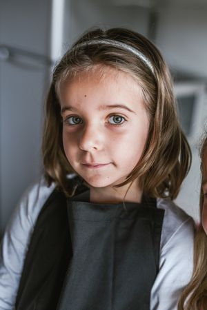 Portrait of young girl looking at camera
