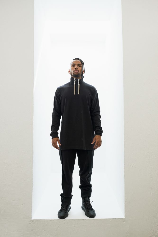 Dancing Black male with braids