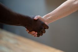 Two people shaking hands