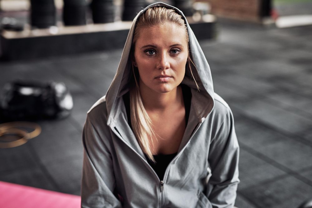 Serious woman wearing a hoodie