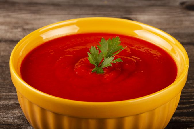 Delicious homemade tomato soup in bowl.