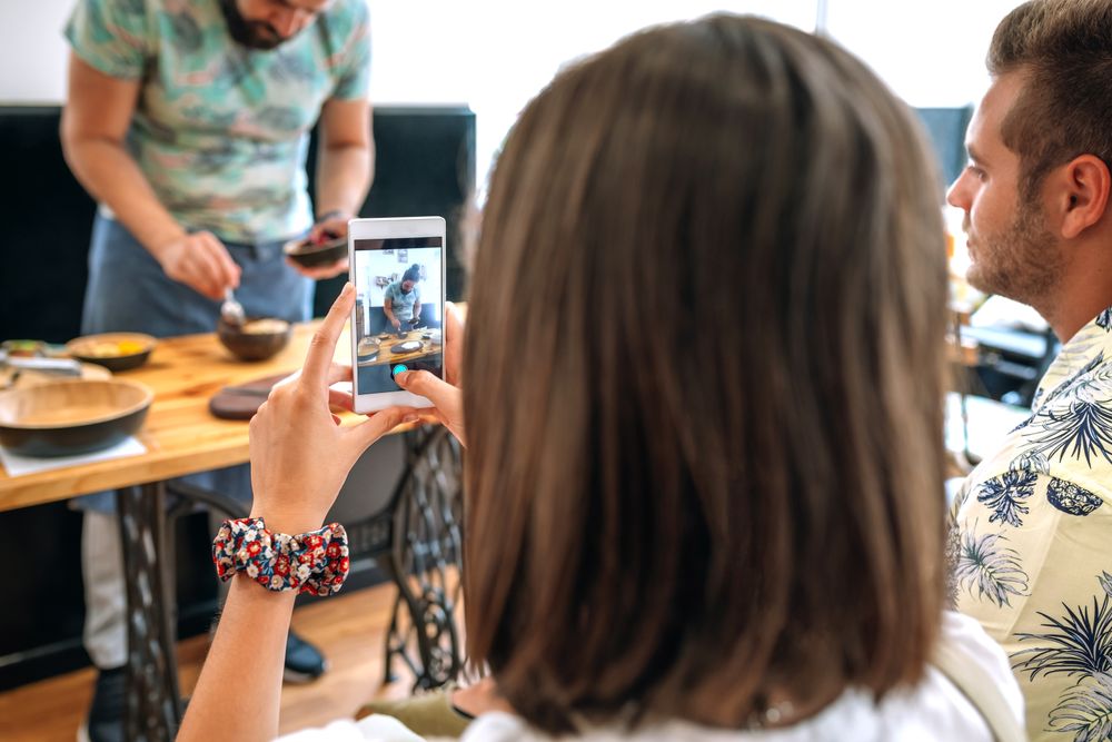 Young cook giving a cooking workshop