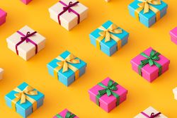 Cream, Aqua and pink presents on orange background