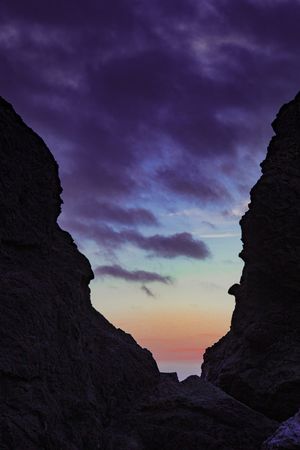 Beach at dusk with beautiful gradient sky, vertical composition