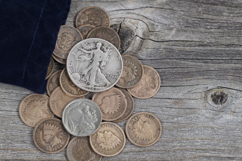 Bag of United States Rare Coins on Wood