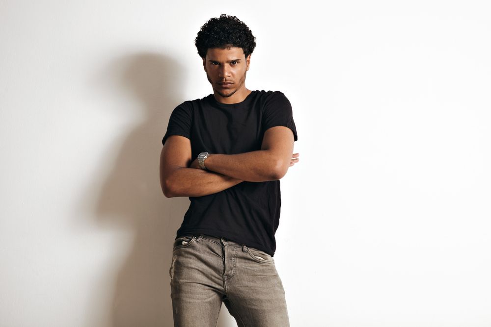 Serious man with arms crossed