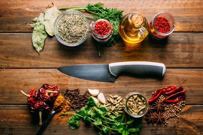 Spices and oil near knife