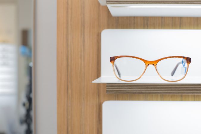 glasses on a shelf in a store