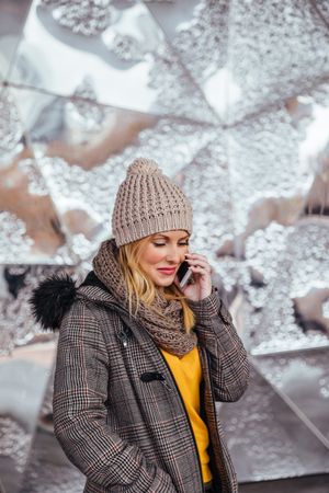 Young woman talking on the phone