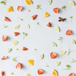 Pattern with strawberry, lime, oranges, leaves