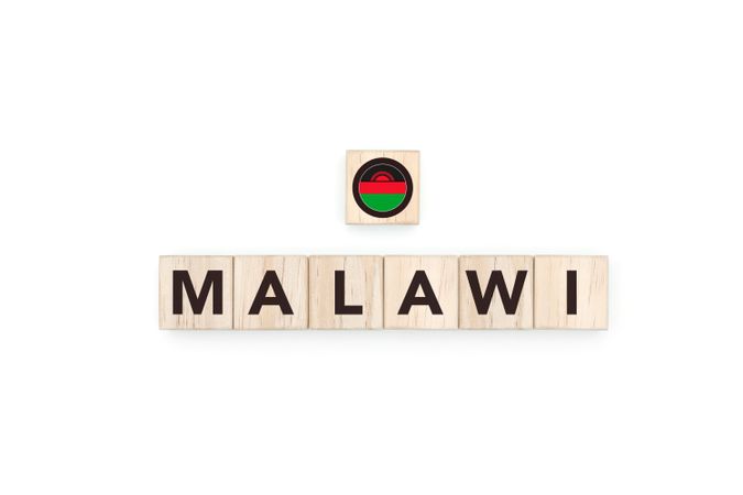 Wooden blocks bearing the name and flag of Malawi.