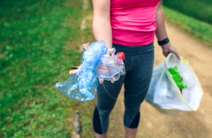 Woman showing garbage