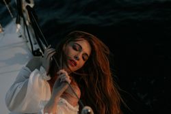 Pretty woman enjoying sea journey