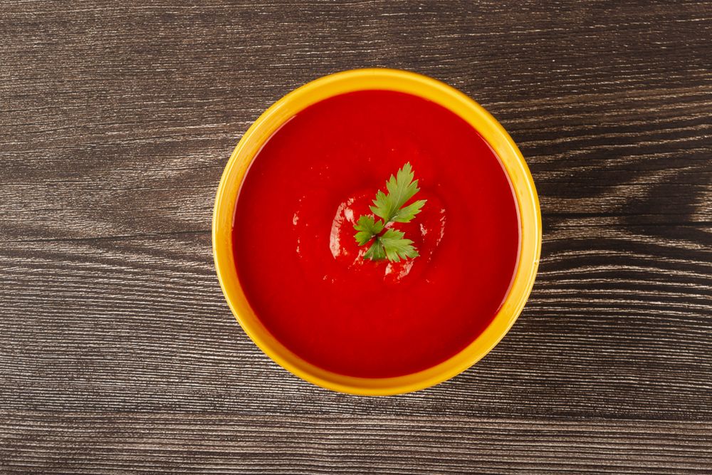 Delicious homemade tomato soup in bowl.