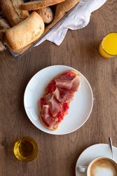 Stylish serving dishes with sandwich for breakfast