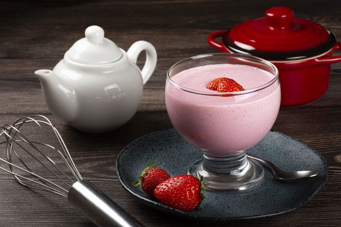 Delicious strawberry mousse in glass goblet.