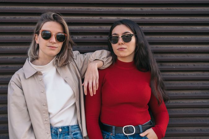 two woman with sunglasses portrait. Blonde and brunette