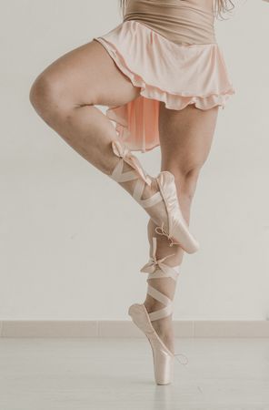 ballerina standing on tip toes