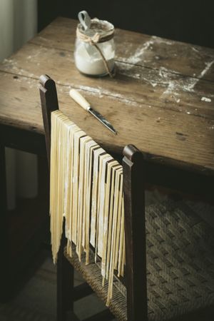 Fresh pasta hanging on chair