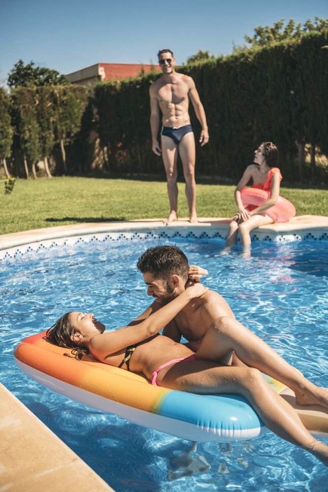 People resting in pool