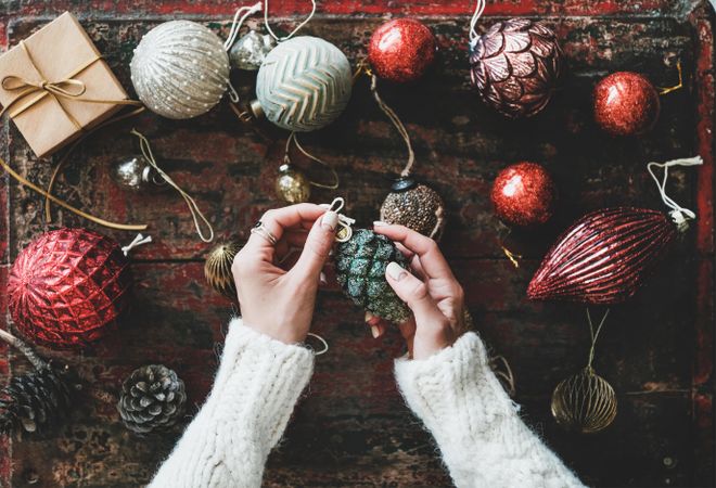Flat-lay of Christmas festive decoration toys, with pinecone top view