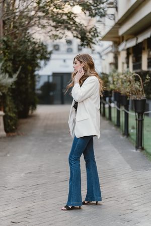 Charming woman posing on street