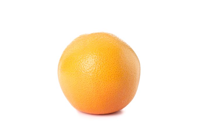Single ripe orange isolated on blank background