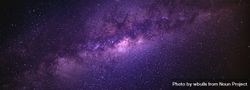 Wide shot of the Milky Way Galaxy with purple colors 0KxEz5