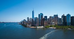 Scenic Aerial New York City View of Lower Manhattan Architecture. Panoramic Wall Street Financial District Image from a Helicopter. Cityscape with Office Buildings and Skyscrapers
