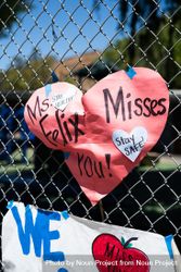 Close up of heart-shaped sign from teacher missing her students during lockdown 0KMoA4