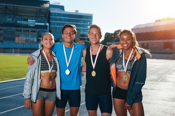 Group of athletes with medals