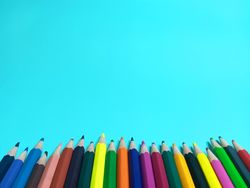 Color pencils on a light blue background