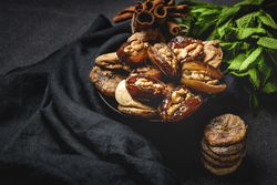Dates fruits with walnuts, mint and cinnamon for Ramadan