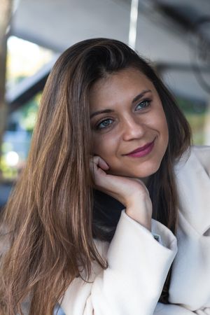 Portrait of smiling woman looking away