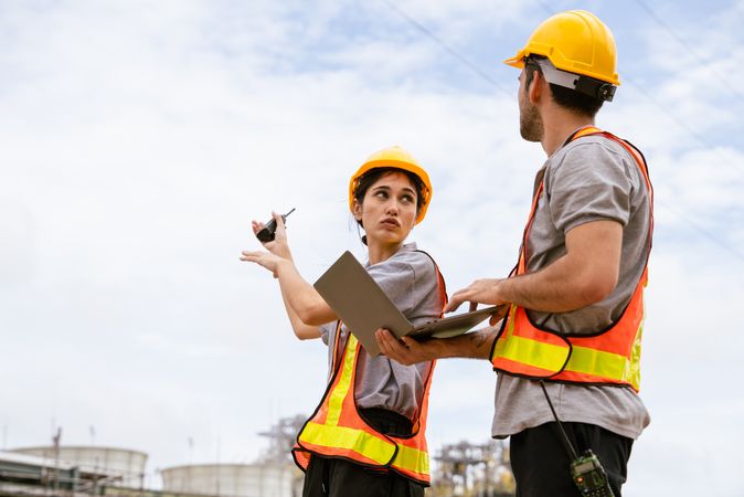 Engineer worker checking project at petrochemical factory or refinery oil plant industrial.