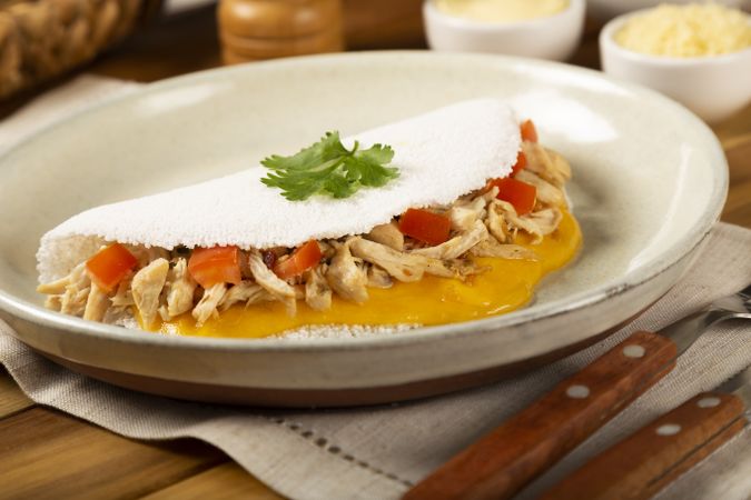 Tapioca stuffed with and chicken. Brazilian tapioca.