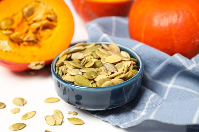 Cooking ingredients for fall season - pumpkin seeds, pumpkin