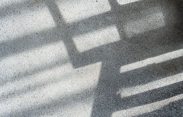Shadows from the window on concrete wall