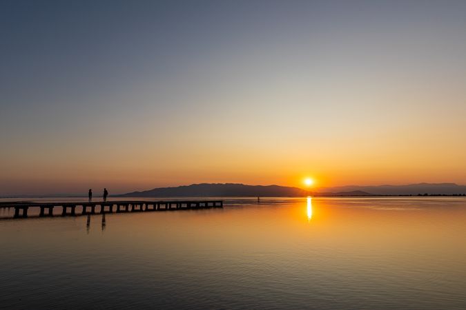 Romantic scene of a couple at sunset